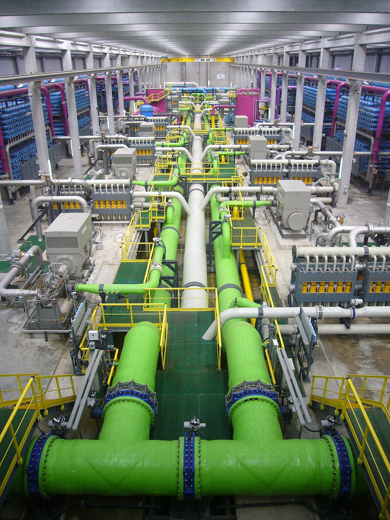 Rows of reverse-osmosis equipment inside the El Prat desalination plant.